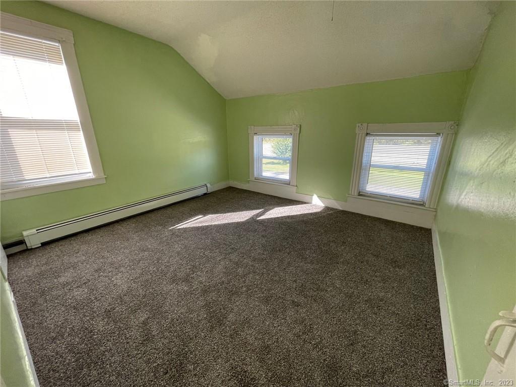 79 River Street, Unit 79 Sprague, CT 06330 - Photo 20 of 25 a view of an empty room with a window