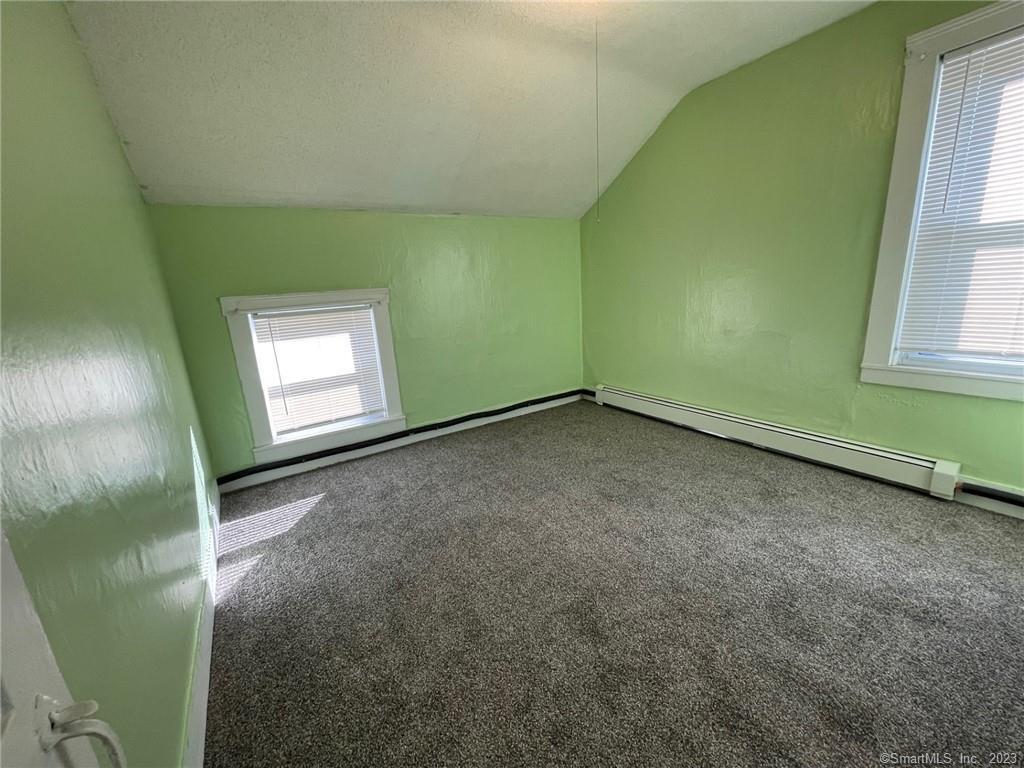 79 River Street, Unit 79 Sprague, CT 06330 - Photo 22 of 25 a view of an empty room with a window