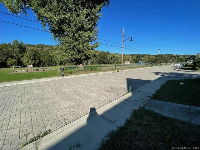 a view of a lake with a yard