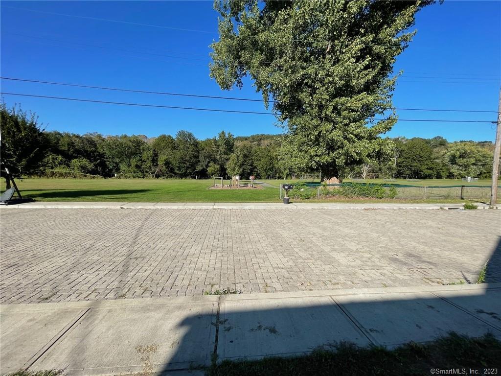 79 River Street, Unit 79 Sprague, CT 06330 - Photo 4 of 25 a view of a park with large trees