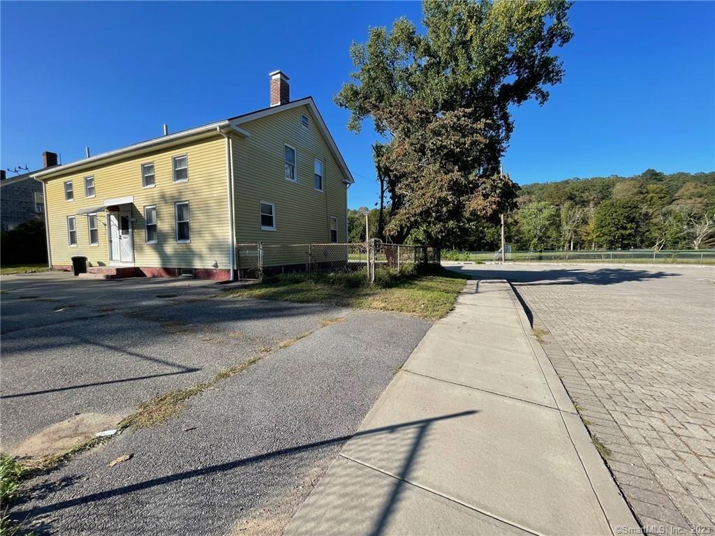 79 River Street, Unit 79 Sprague, CT 06330 - Photo 6 of 25 a view of a street with big house