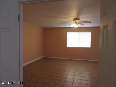 876 Calle Zapotec Rio Rico, AZ 85648 - Photo 7 of 29 a view of an empty room with a window