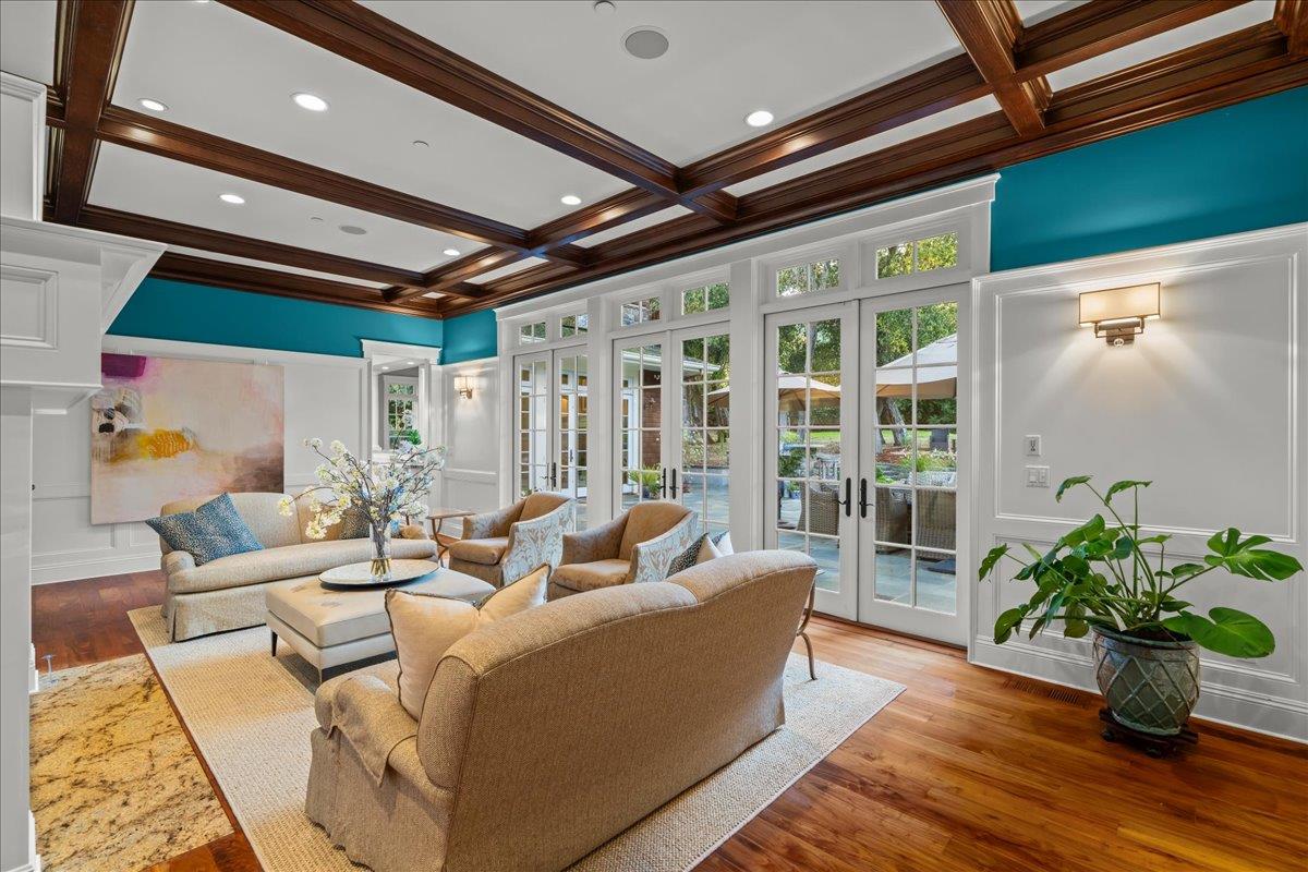 3510 Alpine Road Portola Valley, CA 94028 - Photo 12 of 77 a living room with furniture and potted plants