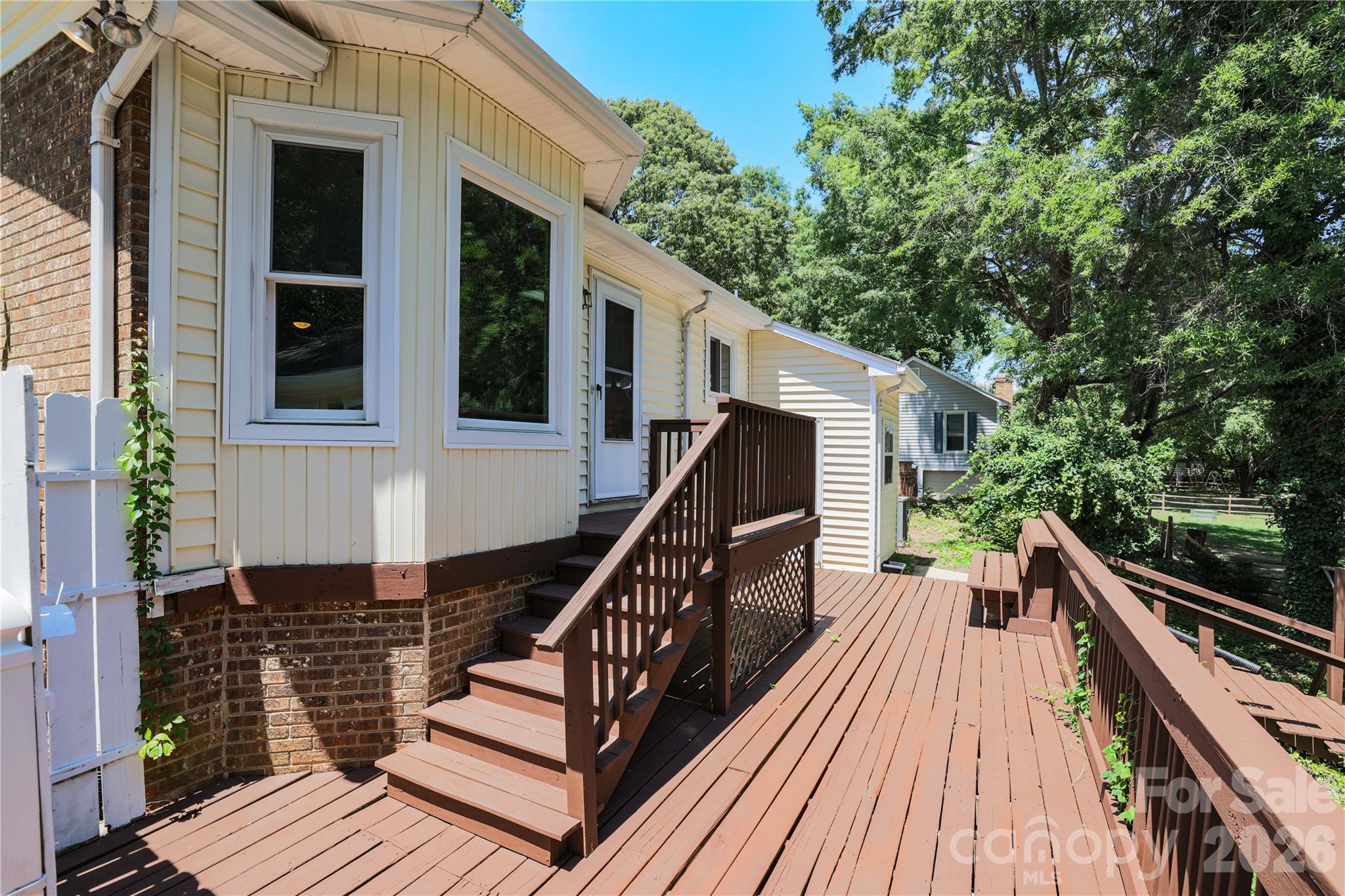 21014 Pine Ridge Drive Cornelius, NC 28031 - Photo 23 of 26 a view of deck with wooden floor and outdoor seating