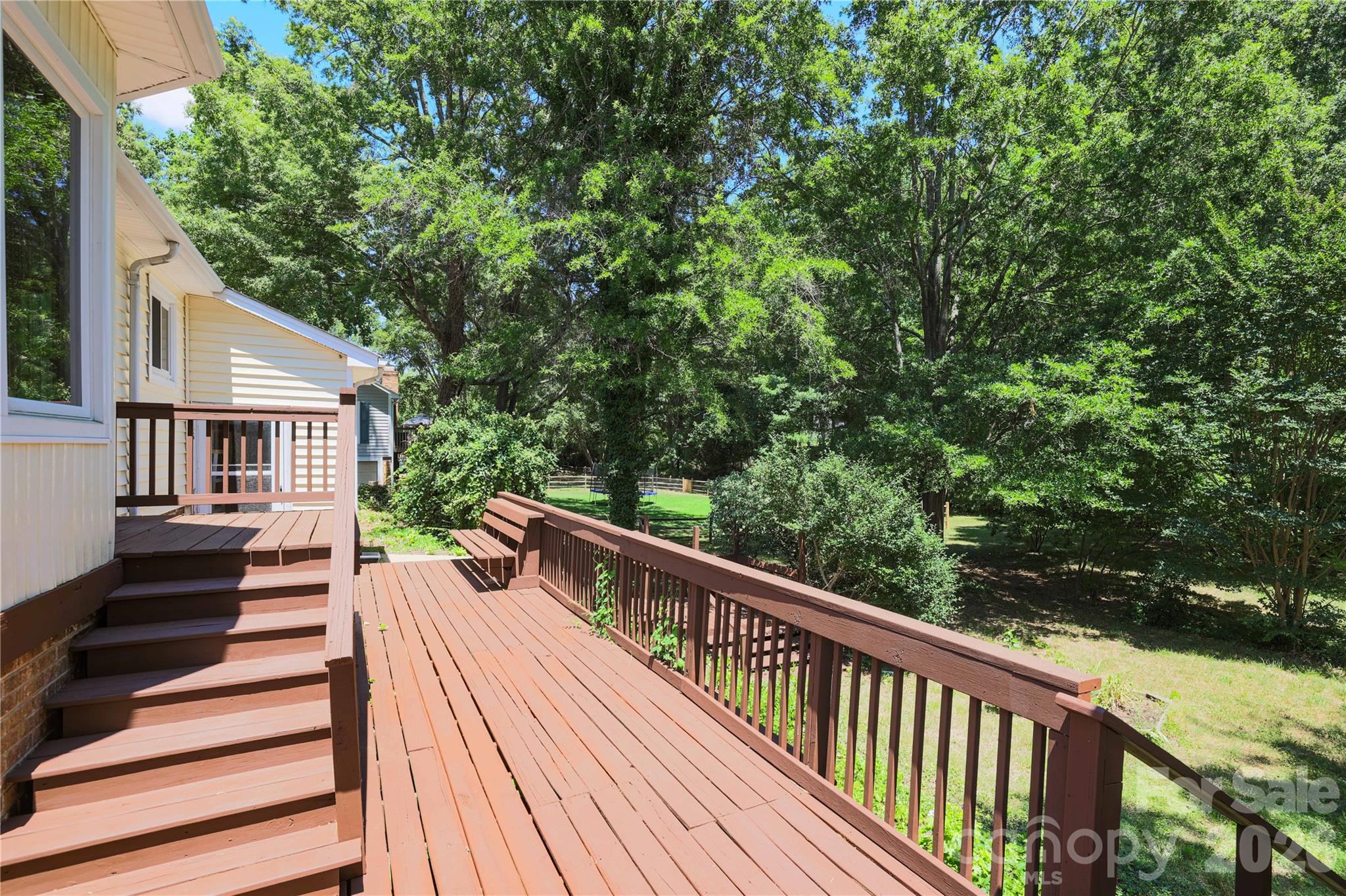 21014 Pine Ridge Drive Cornelius, NC 28031 - Photo 5 of 26 a view of balcony with deck and wooden floor