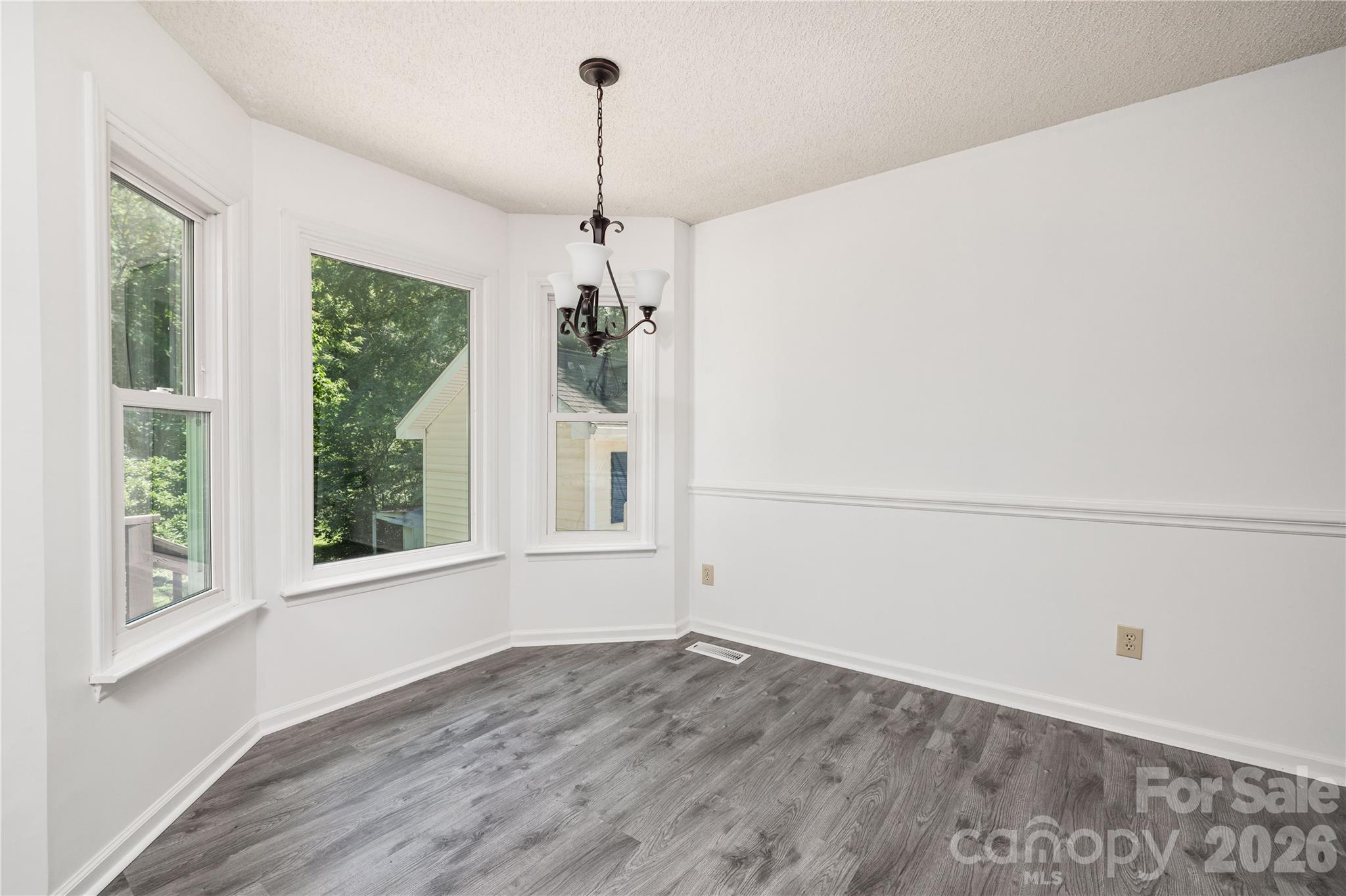 21014 Pine Ridge Drive Cornelius, NC 28031 - Photo 10 of 26 a view of an empty room with a window