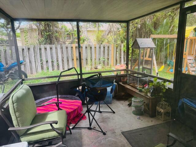 413 Northeast 38th Street Boca Raton, FL 33431 - Photo 10 of 11 Screened Patio & Backyard