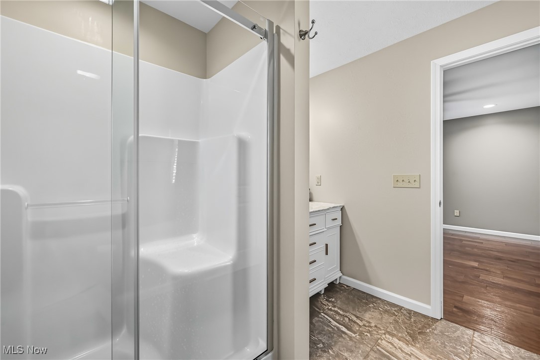 6264 Herbert Road Canfield, OH 44406 - Photo 22 of 47 Bathroom with vanity and a stall shower