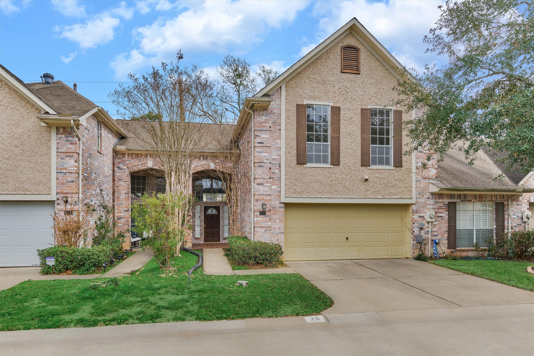 14420 Walters Road, Unit 26 Houston, TX 77014 - Photo 1 of 45 This charming two-story townhouse features a brick and stucco exterior, a two-car garage, and a welcoming front entrance. Perfect for comfortable living and convenience to FM 1960.