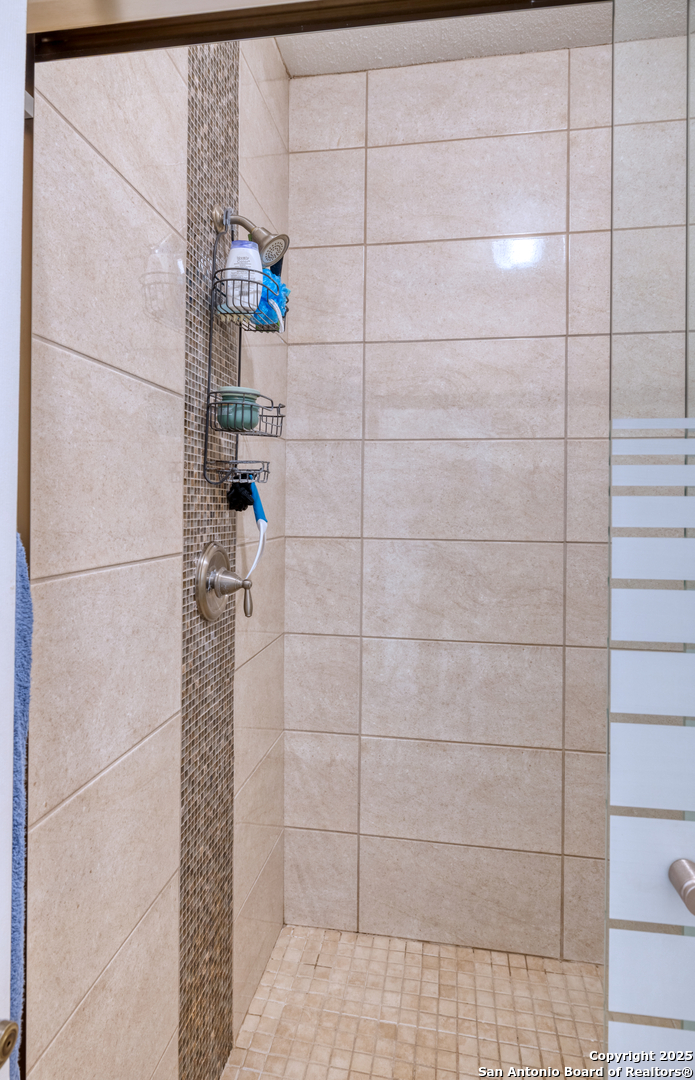 333 Studer Street Uvalde, TX 78801 - Photo 13 of 29 a bathroom with a shower