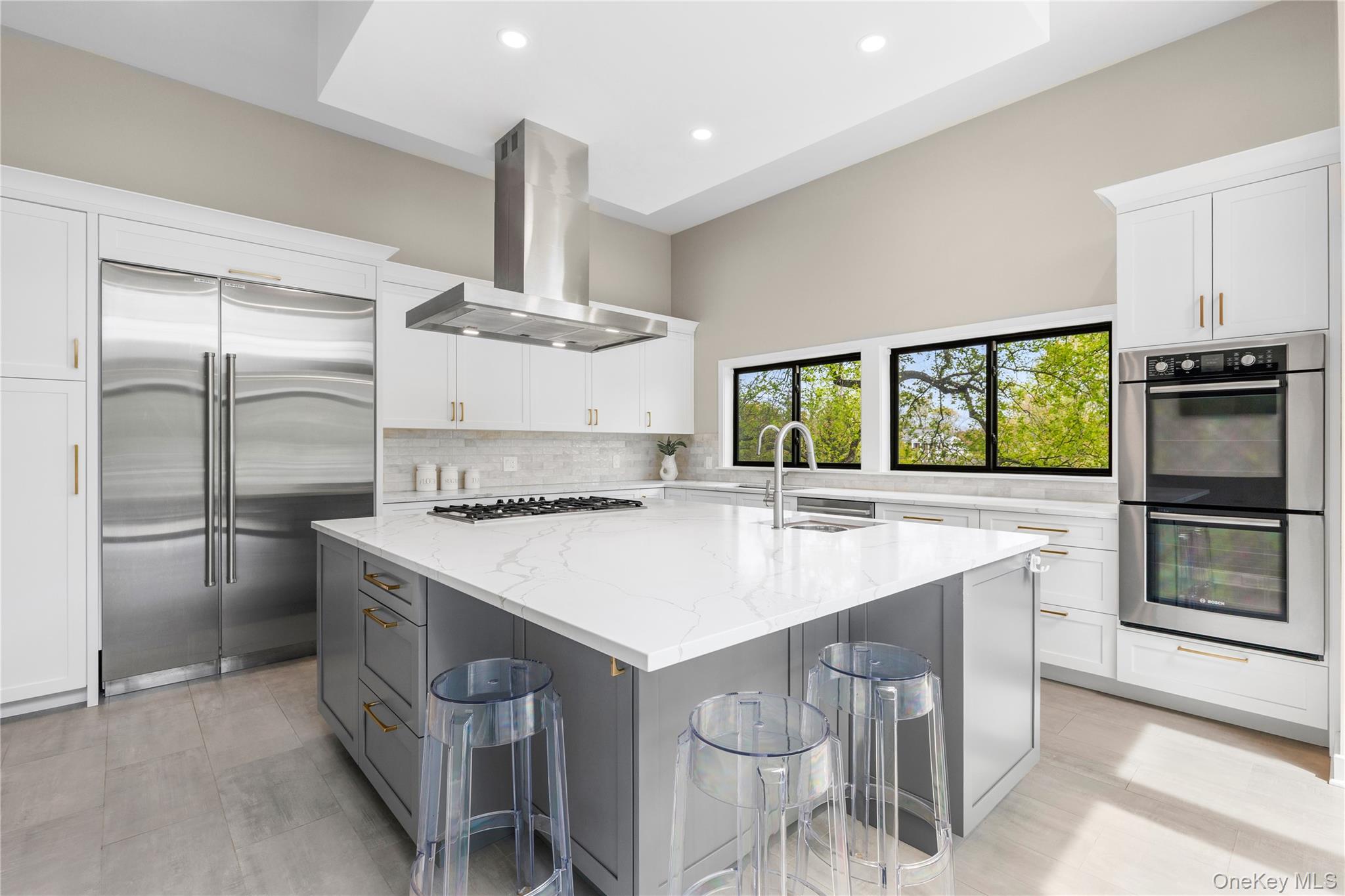3 Lakeside Drive Rye, NY 10580 - Photo 3 of 31 a kitchen with a sink stainless steel appliances and cabinets
