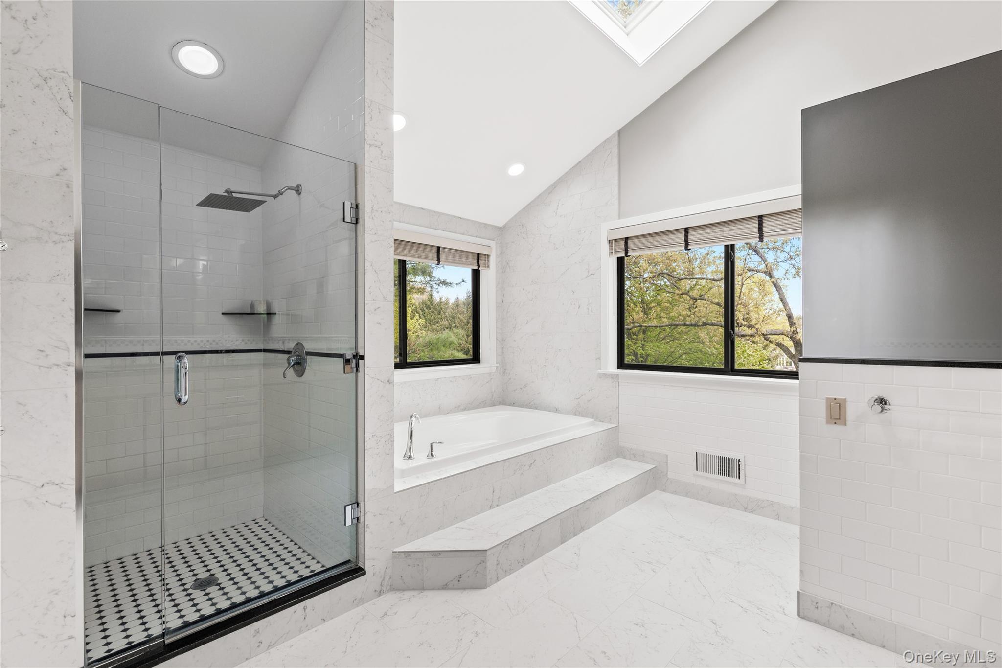 3 Lakeside Drive Rye, NY 10580 - Photo 10 of 31 a bathroom with a tub and a shower