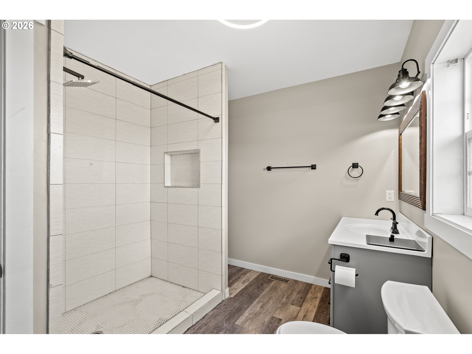 53671 Appleton Road Milton Freewater, OR 97862 - Photo 24 of 41 a bathroom with a sink a mirror and a shower
