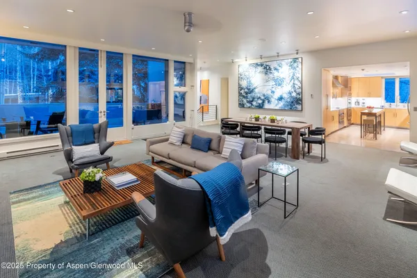 a kitchen with a stove a refrigerator and a sink