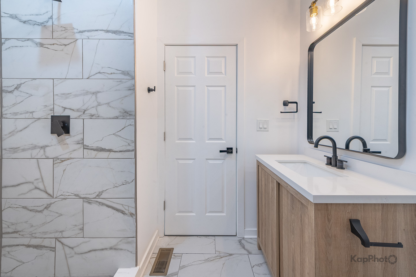 2139 West 24th Street Chicago, IL 60608 - Photo 22 of 29 a bathroom with a sink and a mirror
