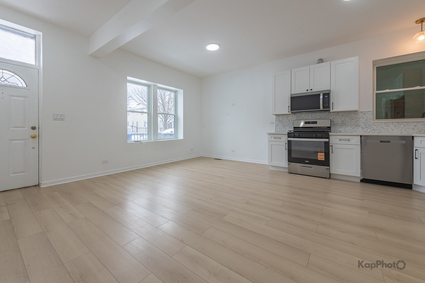2139 West 24th Street Chicago, IL 60608 - Photo 5 of 29 a view of kitchen with wooden floor electronic appliances and window