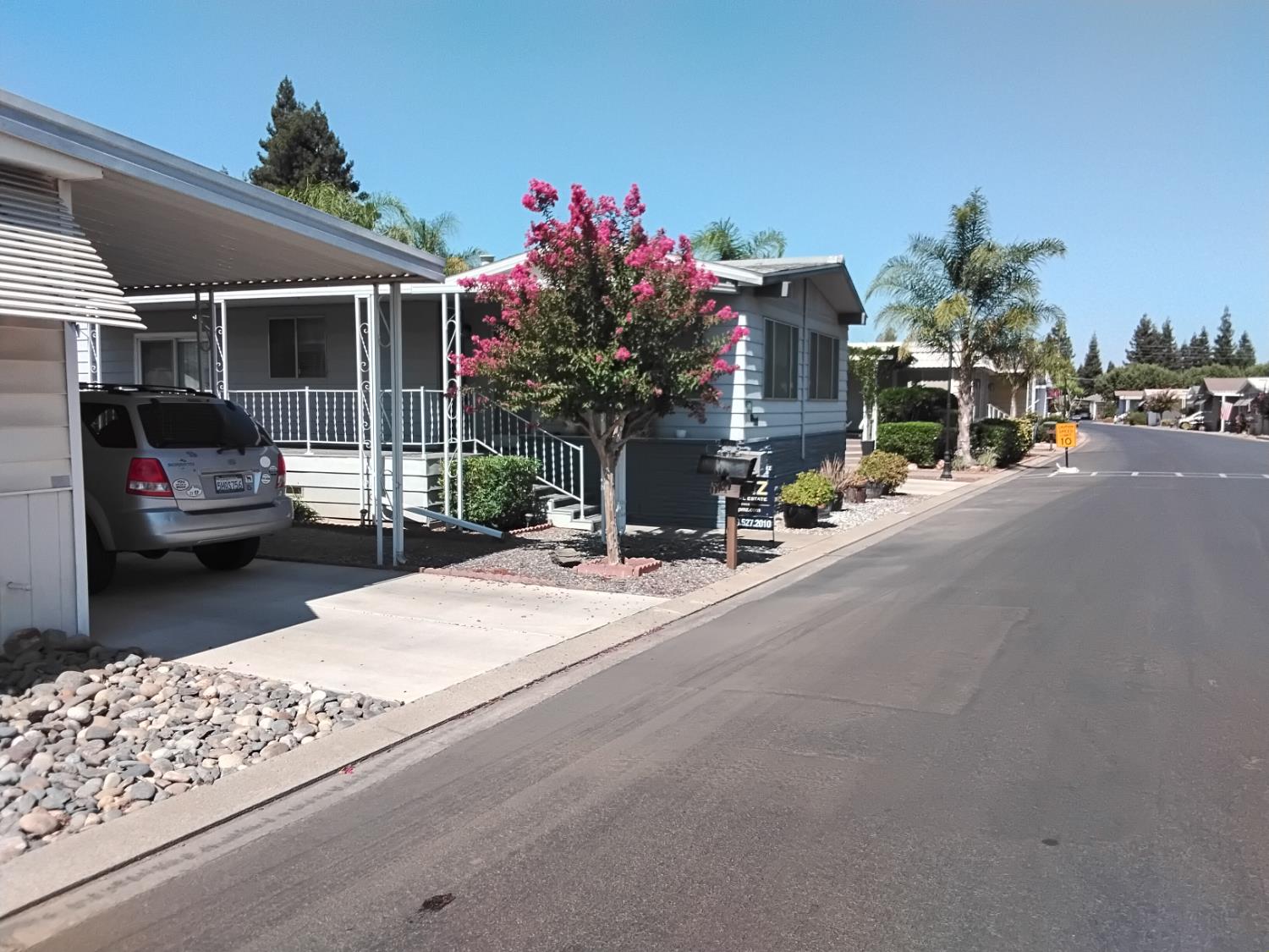 a view of a street with cars on the road
