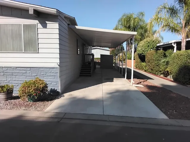 a view of a house with a patio