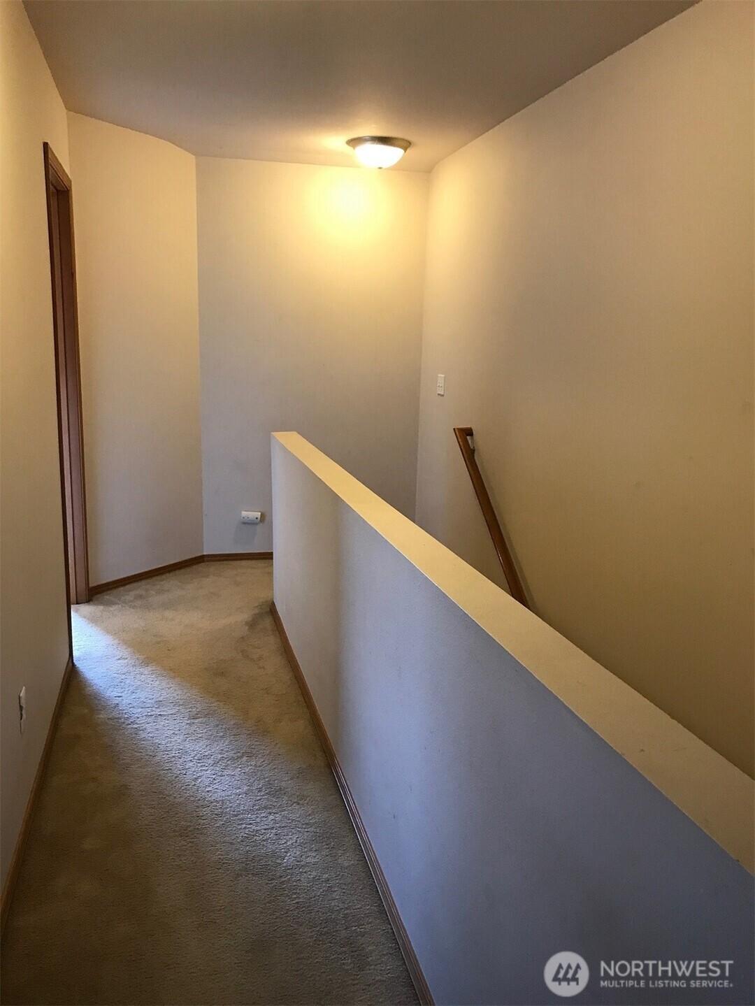 12723 35th Avenue Northeast, Unit A Seattle, WA 98125 - Photo 5 of 11 a view of a big room with wooden floor