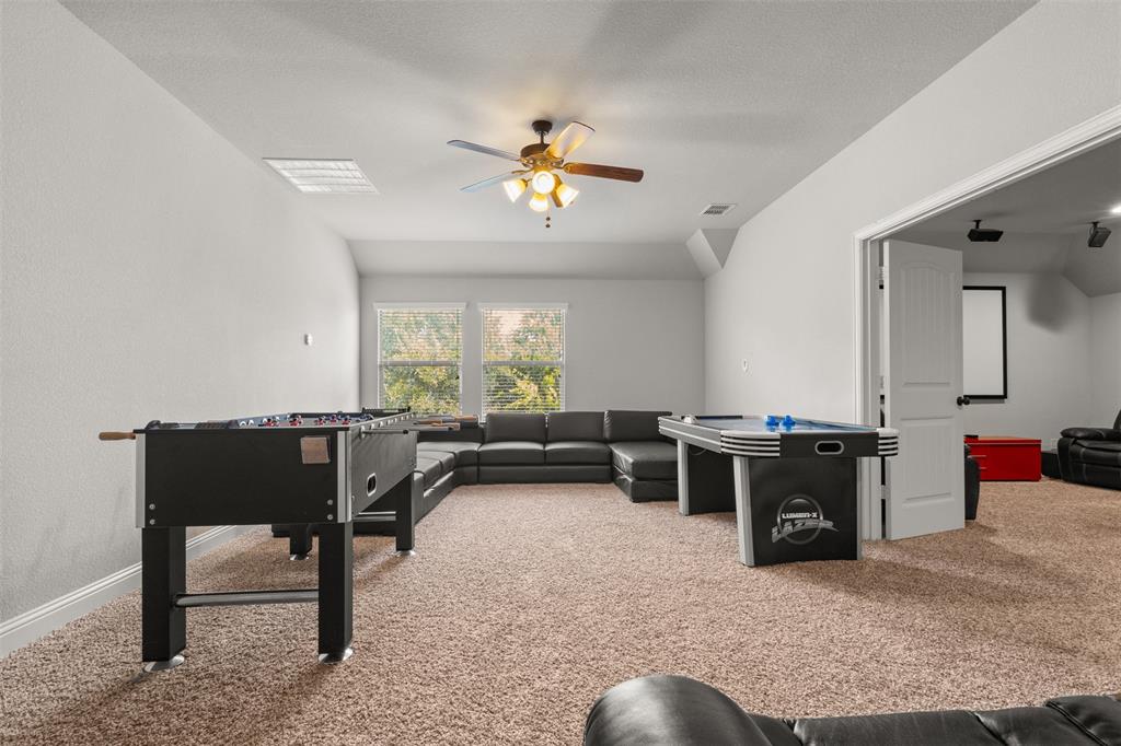 800 Goose Court Forney, TX 75126 - Photo 19 of 34 a living room with furniture