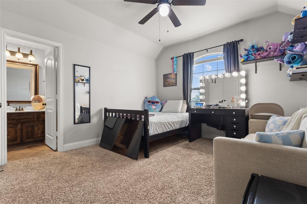 800 Goose Court Forney, TX 75126 - Photo 28 of 34 a bedroom with furniture and window