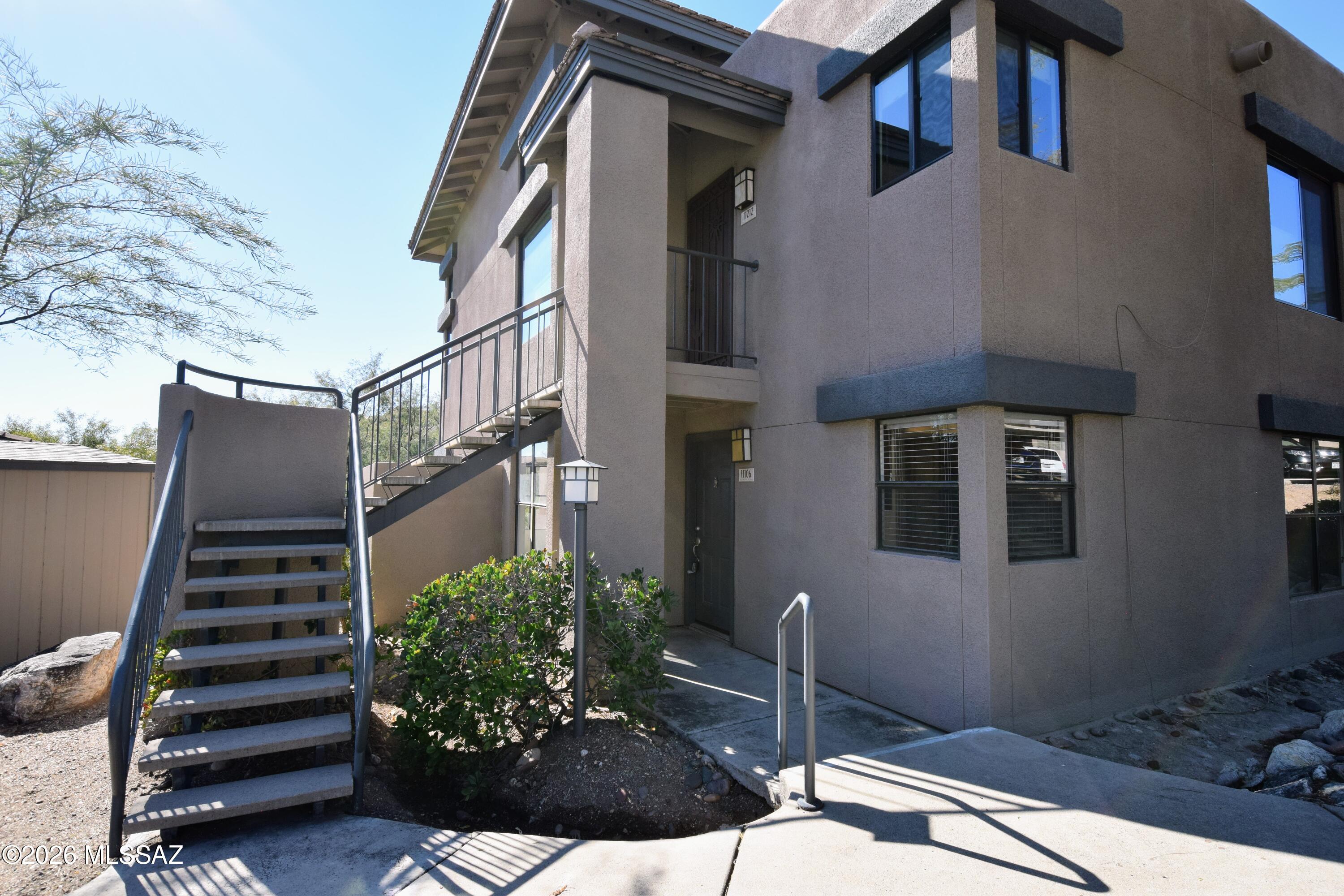 5855 North Kolb Road, Unit 11106 Tucson, AZ 85750 - Photo 31 of 36 a view of a house with a yard