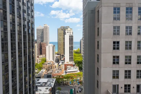 a view of a city with tall buildings