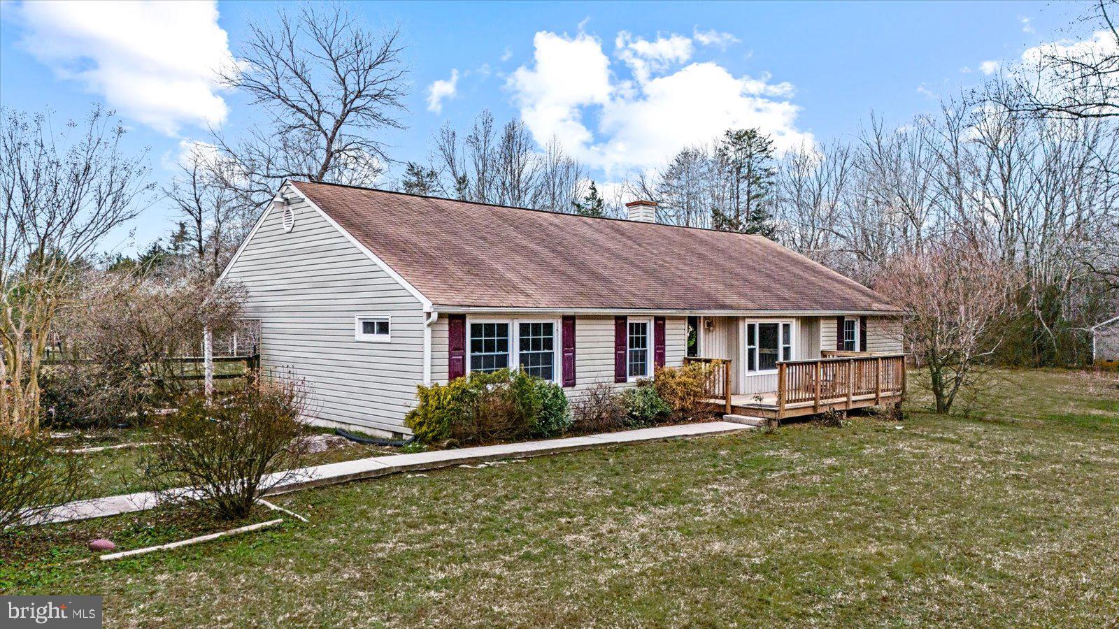 312 Timber Trail Spotsylvania, VA 22551 - Photo 2 of 74 a view of a house with backyard and trees
