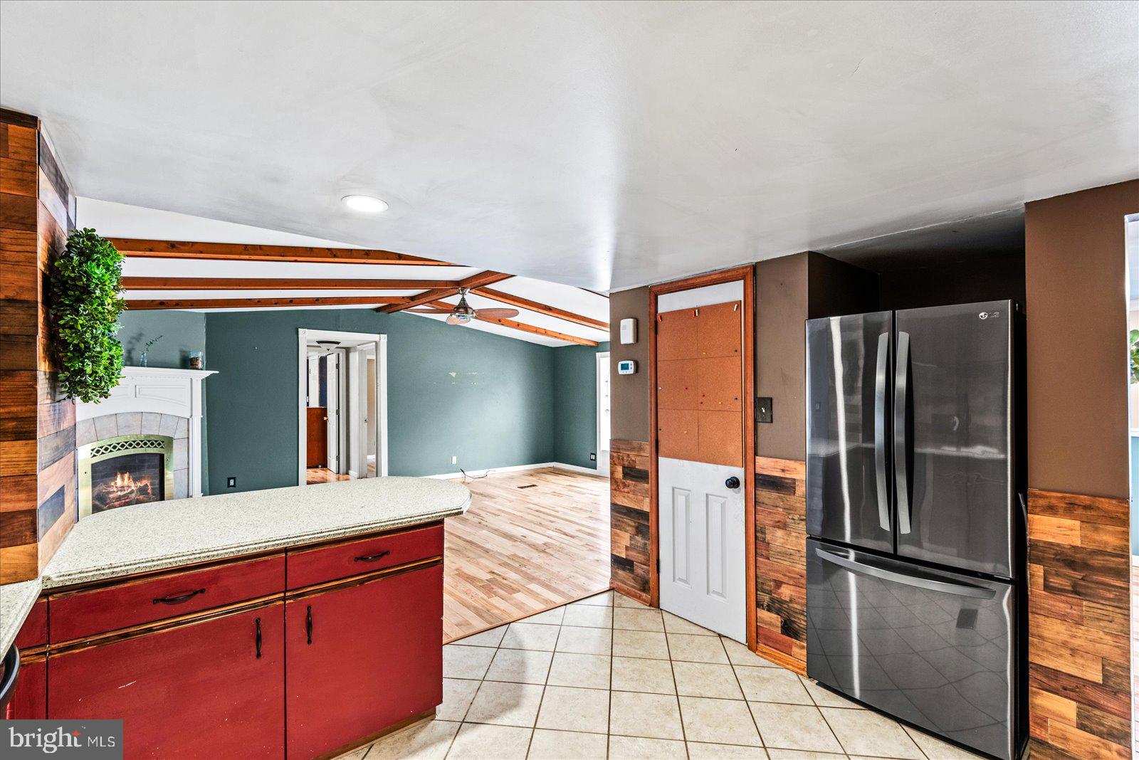 312 Timber Trail Spotsylvania, VA 22551 - Photo 34 of 74 a kitchen with stainless steel appliances granite countertop a refrigerator and a sink