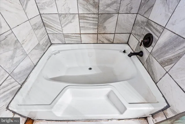 an aerial view of residential house with outdoor space