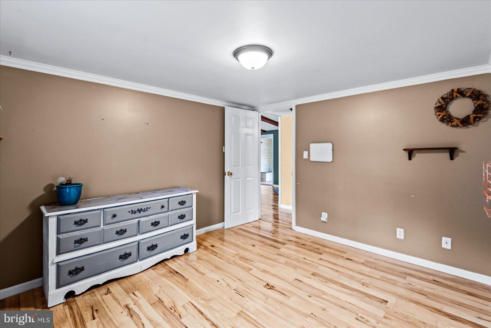 312 Timber Trail Spotsylvania, VA 22551 - Photo 49 of 74 a view of wooden floor and windows in a room