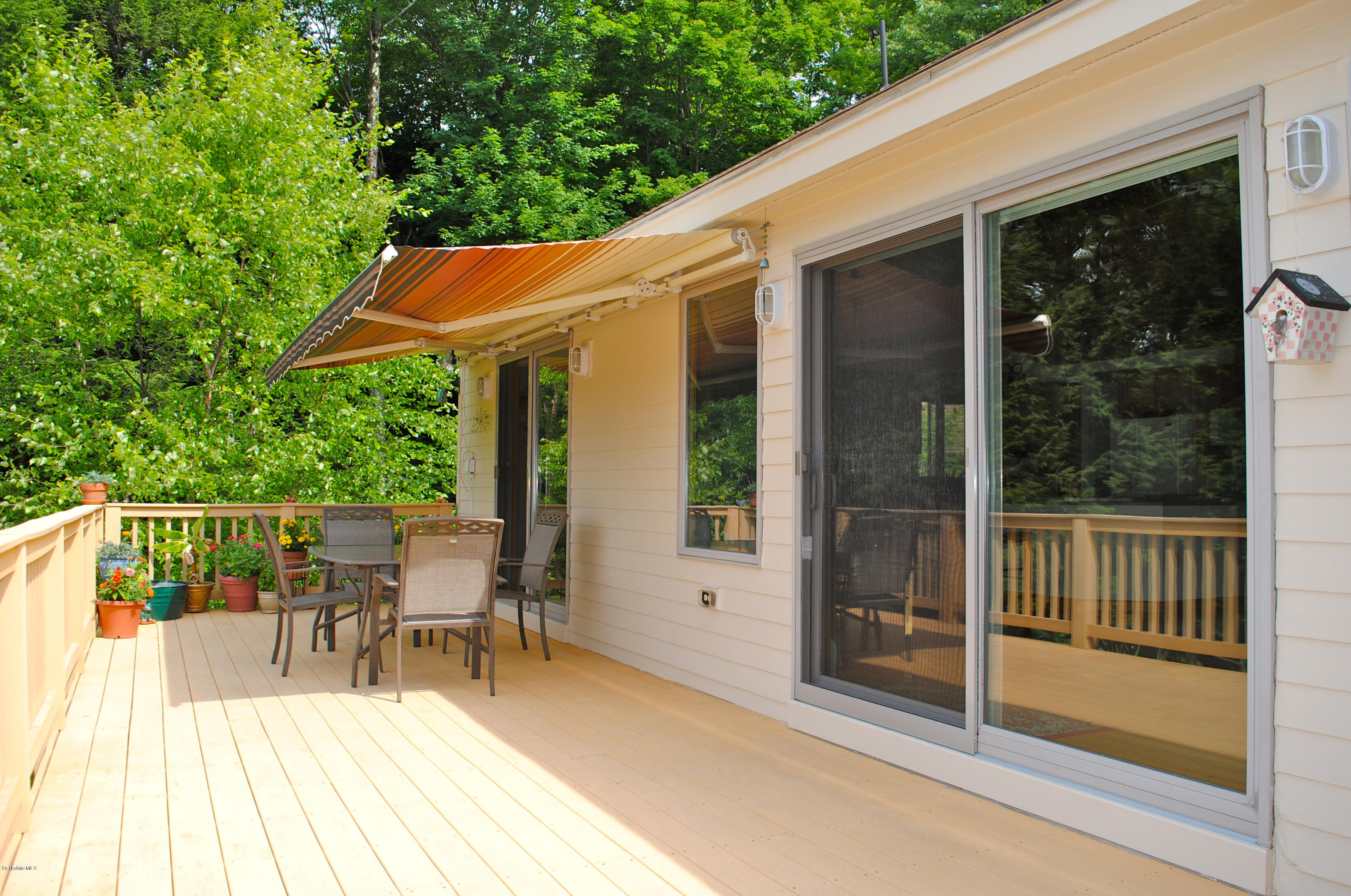 105 Sugar House Road Otis, MA 01253 - Photo 6 of 16 Deck is length of house