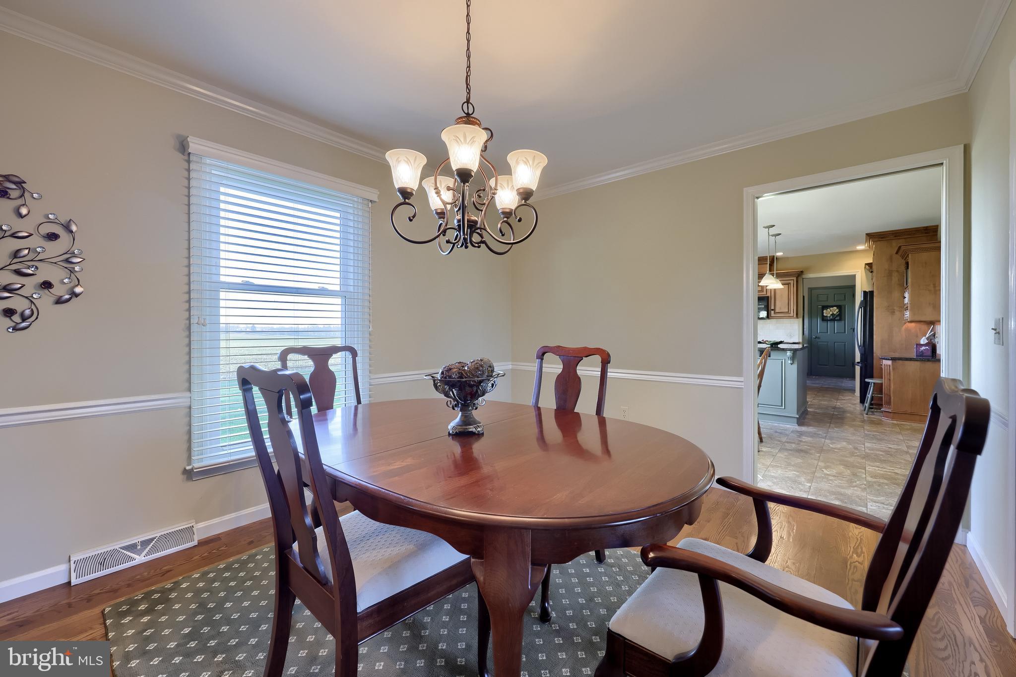 2 Mill Ridge Court Lancaster, PA 17601 - Photo 14 of 79 a view of a dining room with furniture and wooden floor