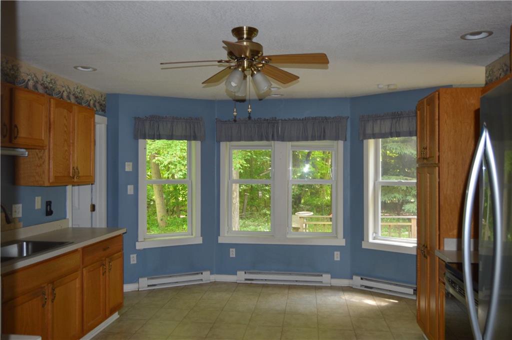3244 Maple Lane Jamestown, PA 16134 - Photo 9 of 27 a room with window and a ceiling fan