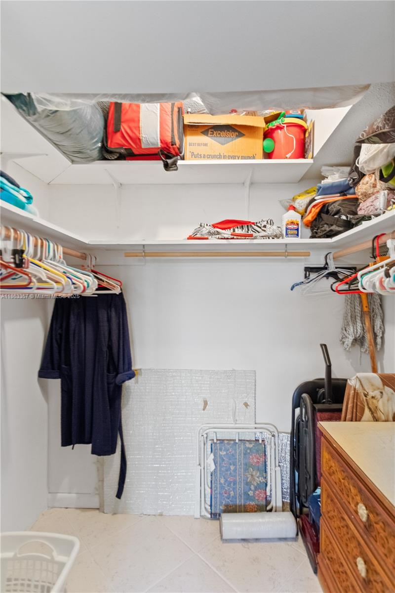 4299 Northwest 16th Street, Unit 210 Lauderhill, FL 33313 - Photo 21 of 37 a utility room with dryer and washer