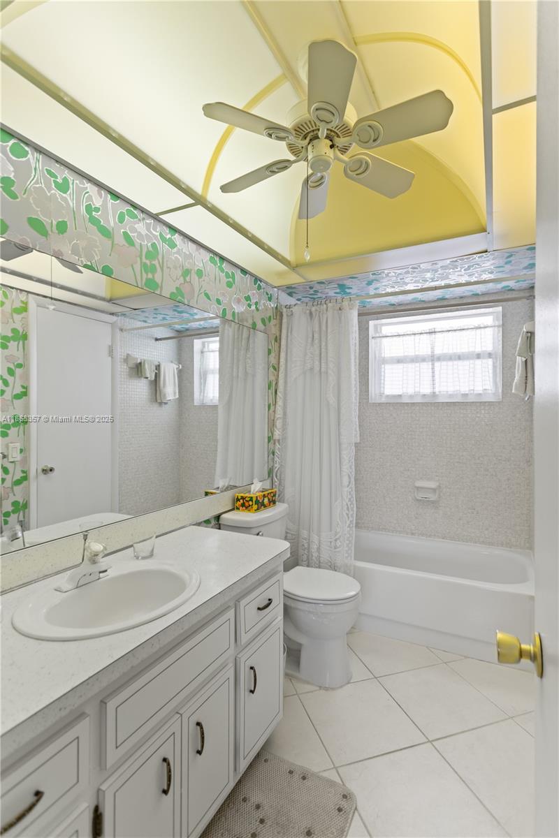 4299 Northwest 16th Street, Unit 210 Lauderhill, FL 33313 - Photo 25 of 37 a bathroom with a sink a toilet and shower