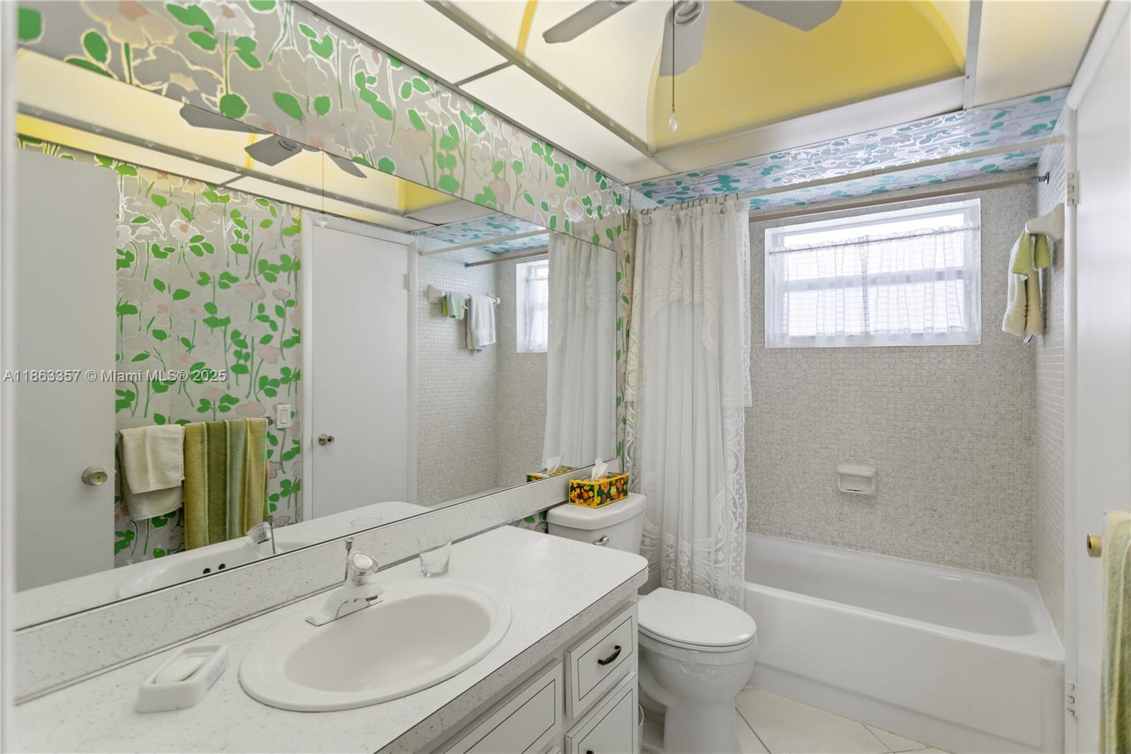 4299 Northwest 16th Street, Unit 210 Lauderhill, FL 33313 - Photo 26 of 37 a bathroom with a sink a toilet and shower