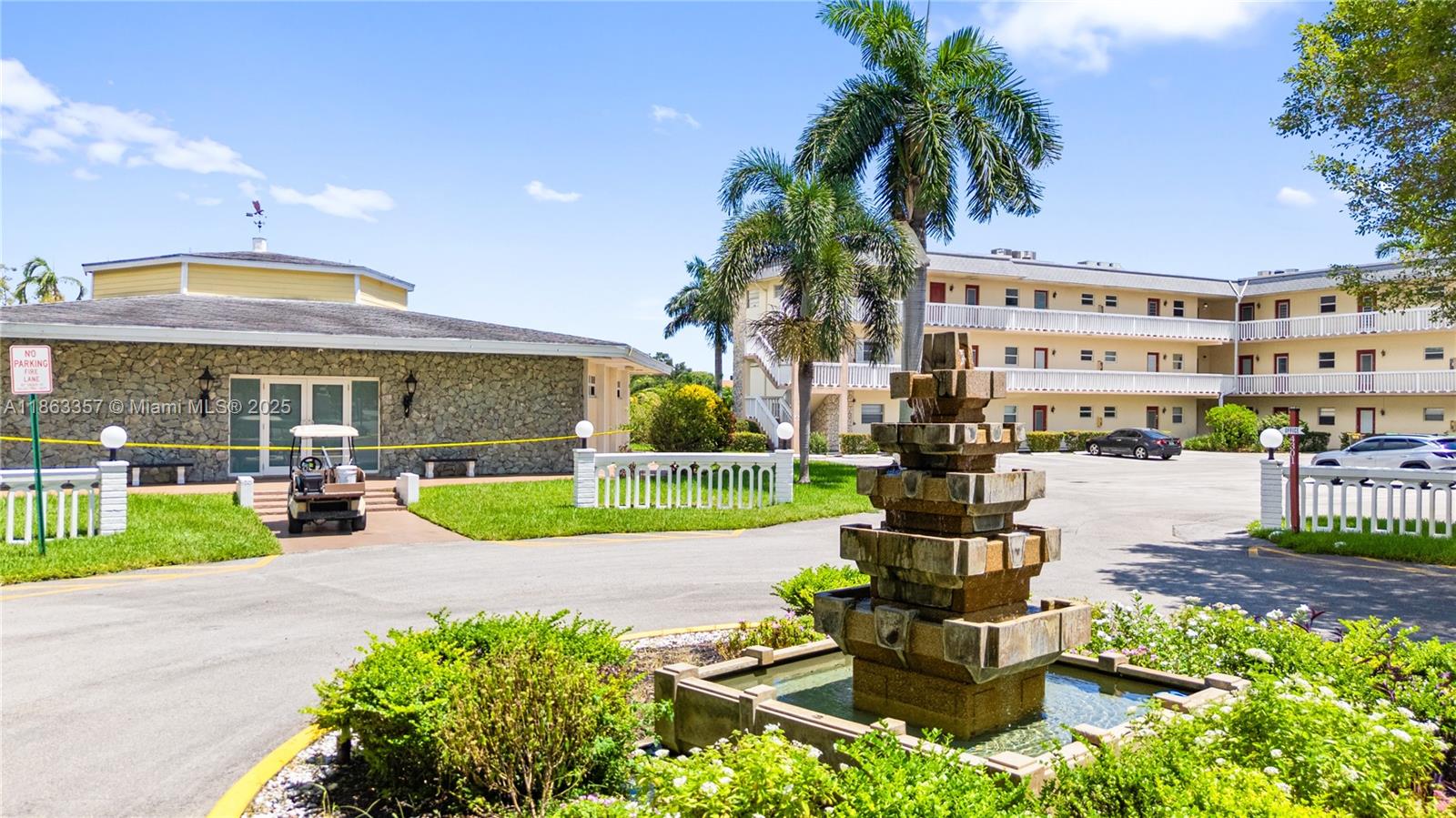 4299 Northwest 16th Street, Unit 210 Lauderhill, FL 33313 - Photo 30 of 37 a view of a house with garden and sitting area