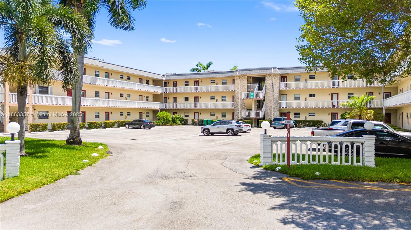 4299 Northwest 16th Street, Unit 210 Lauderhill, FL 33313 - Photo 31 of 37 a view of a building with a yard