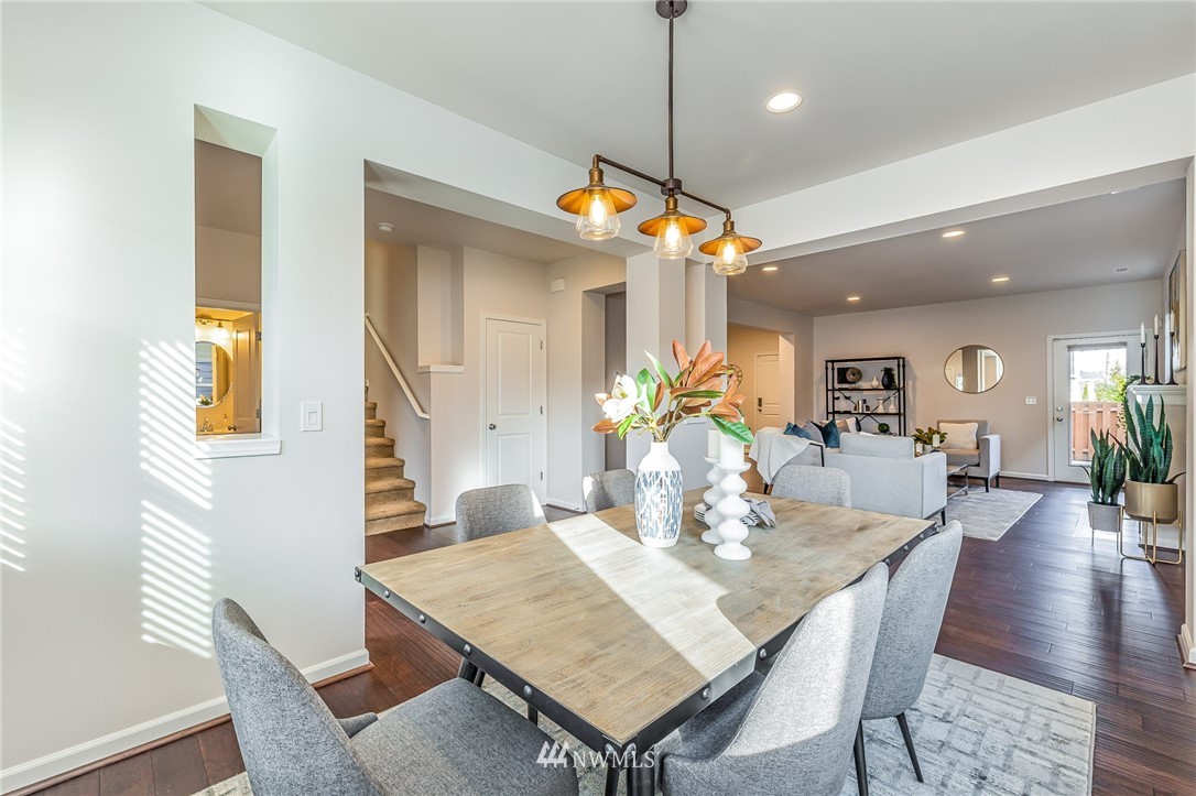 4303 Riverfront Boulevard Everett, WA 98203 - Photo 17 of 40 a view of a dining room with furniture and wooden floor