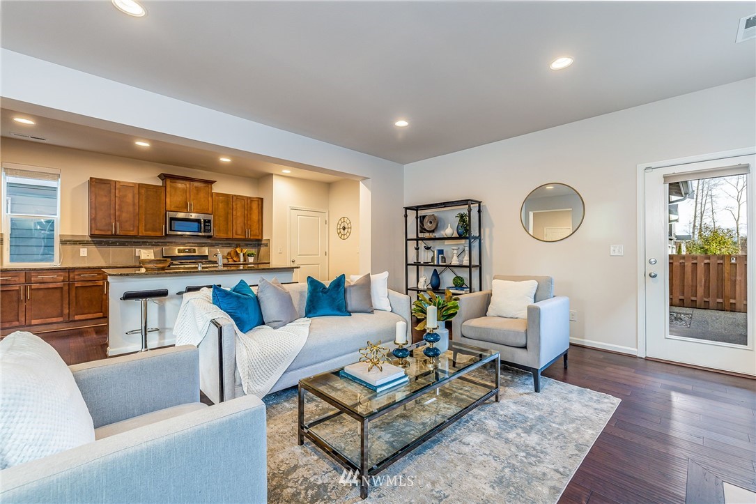 4303 Riverfront Boulevard Everett, WA 98203 - Photo 8 of 40 a living room with furniture and kitchen view