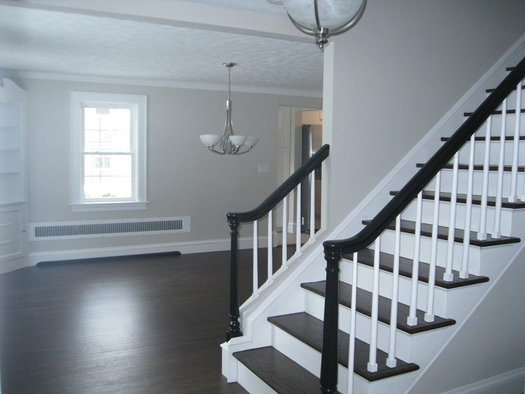 83 Flagg Street Worcester, MA 01602 - Photo 23 of 25 a view of entryway and hall with wooden floor
