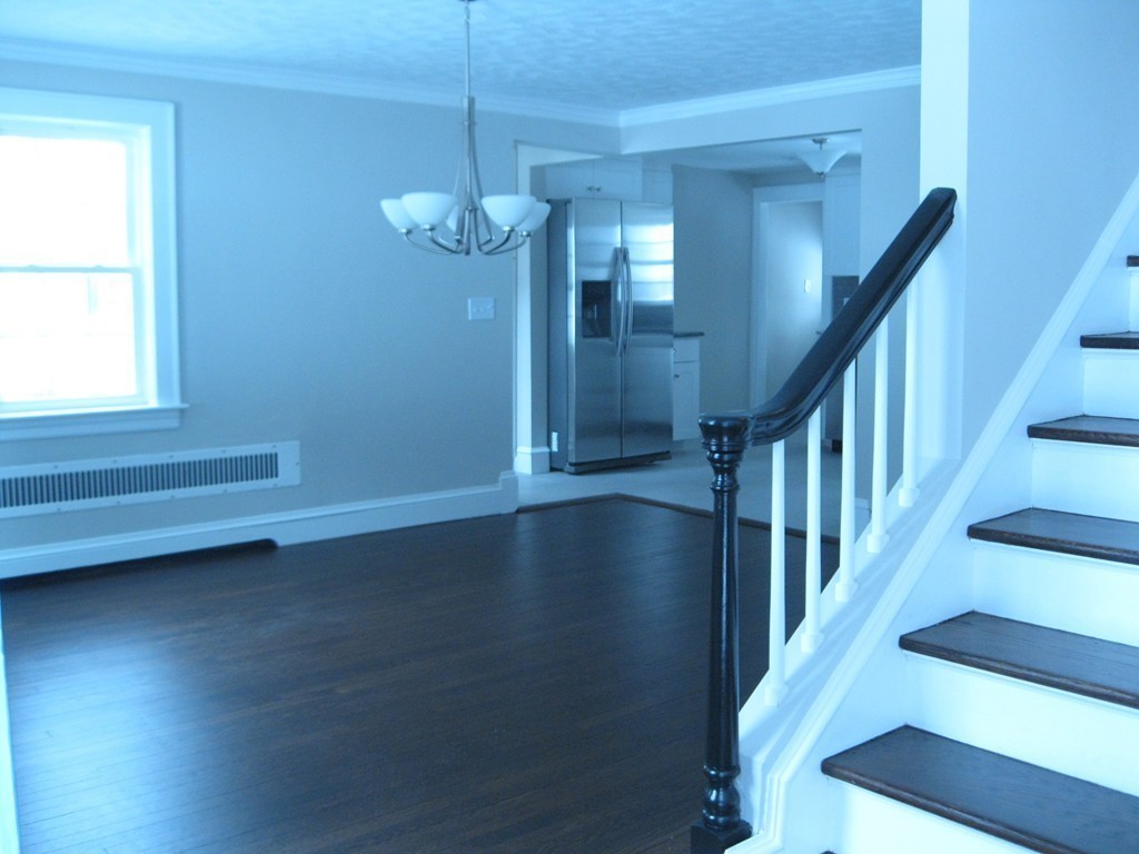 83 Flagg Street Worcester, MA 01602 - Photo 3 of 25 a view of entryway with wooden floor