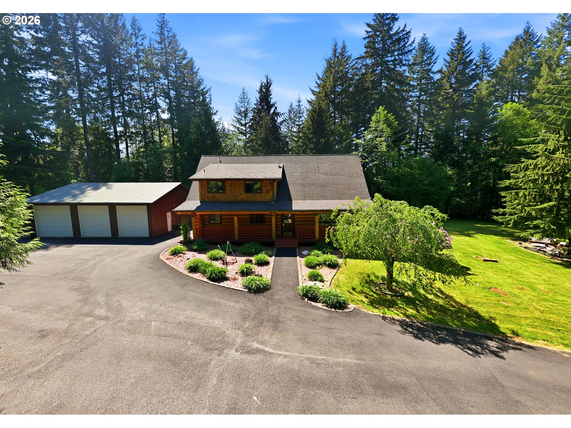 390 Spruce Creek Road Longview, WA 98632 - Photo 40 of 45 a front view of a house with garden