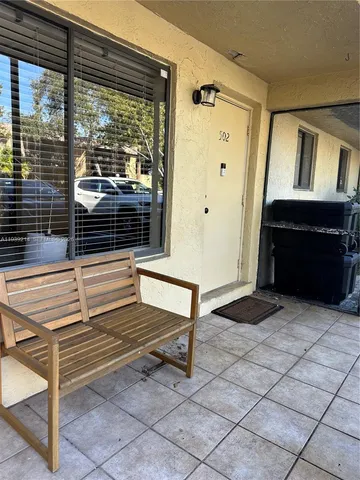 a view of entryway with a front door