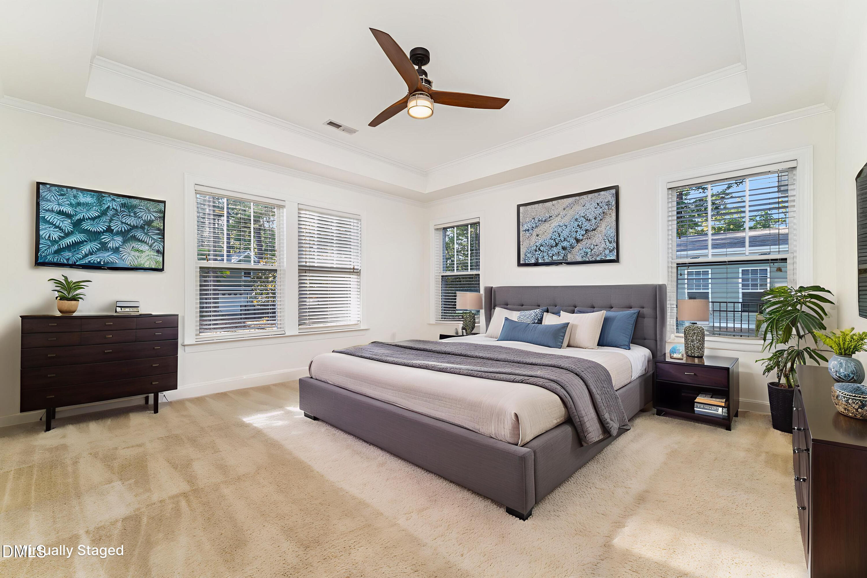 105 Leesville Loop Aberdeen, NC 28315 - Photo 15 of 32 a spacious bedroom with a bed and a couch