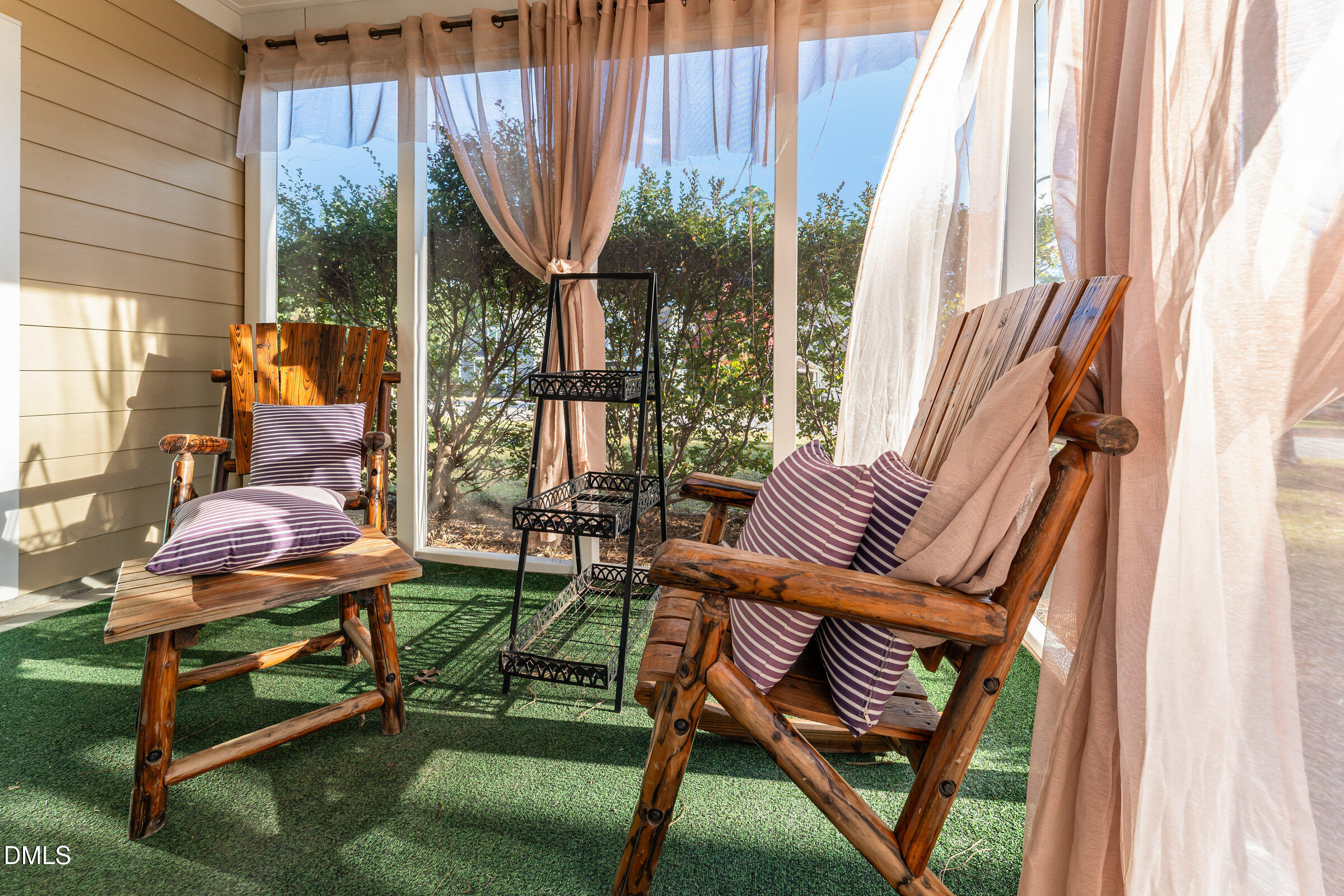 105 Leesville Loop Aberdeen, NC 28315 - Photo 28 of 32 a view of balcony with two chairs and a potted plant