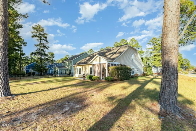 a view of a yard in front of the house