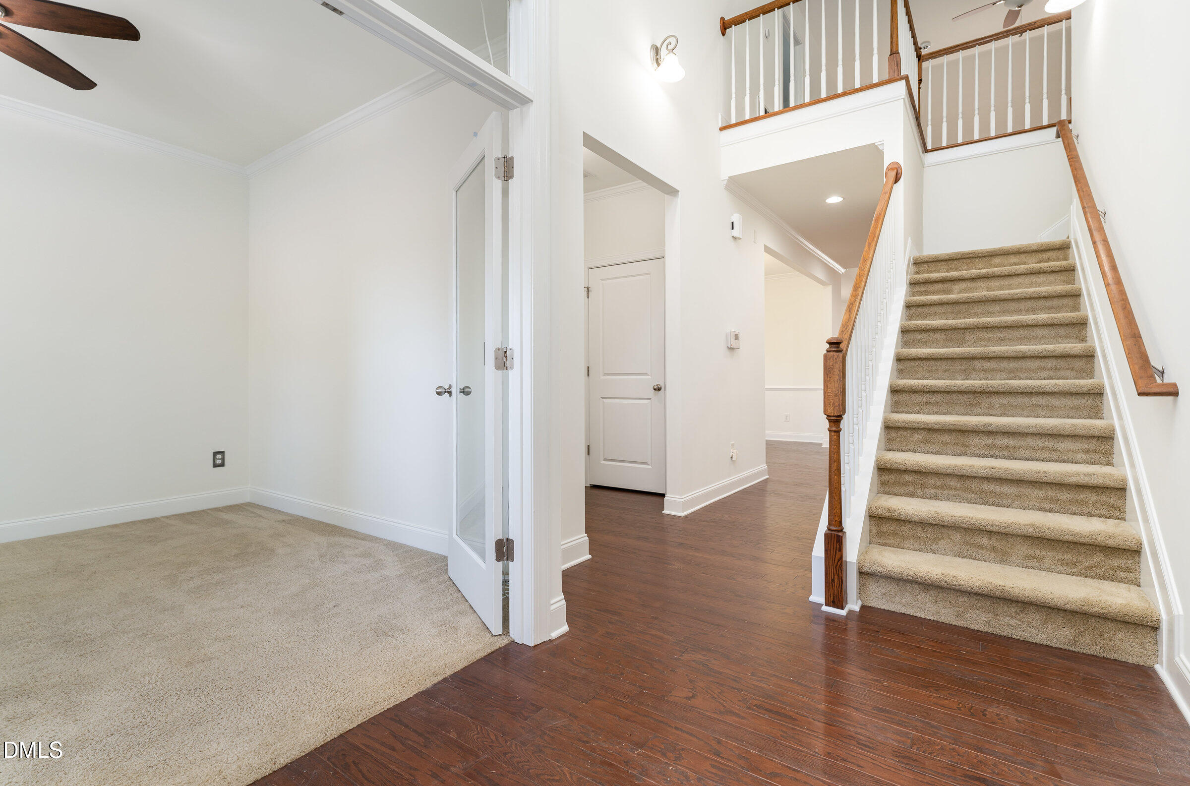 105 Leesville Loop Aberdeen, NC 28315 - Photo 5 of 32 a view of a hallway with wooden floor and entryway