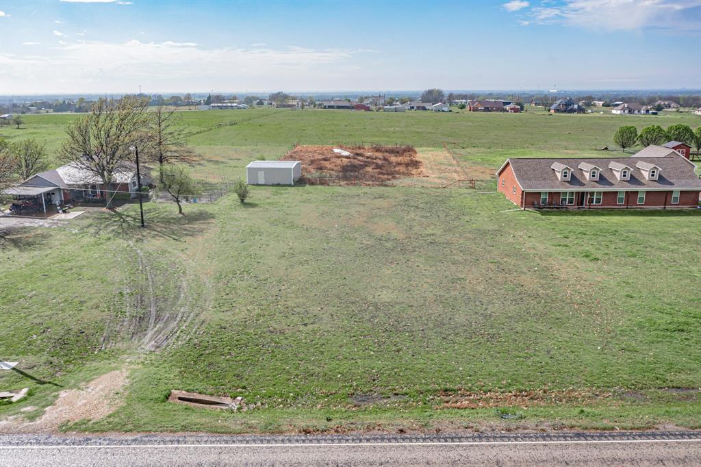 0 Fm 1138 Nevada, TX 75173 - Photo 13 of 15 a view of a lake with a yard and large trees